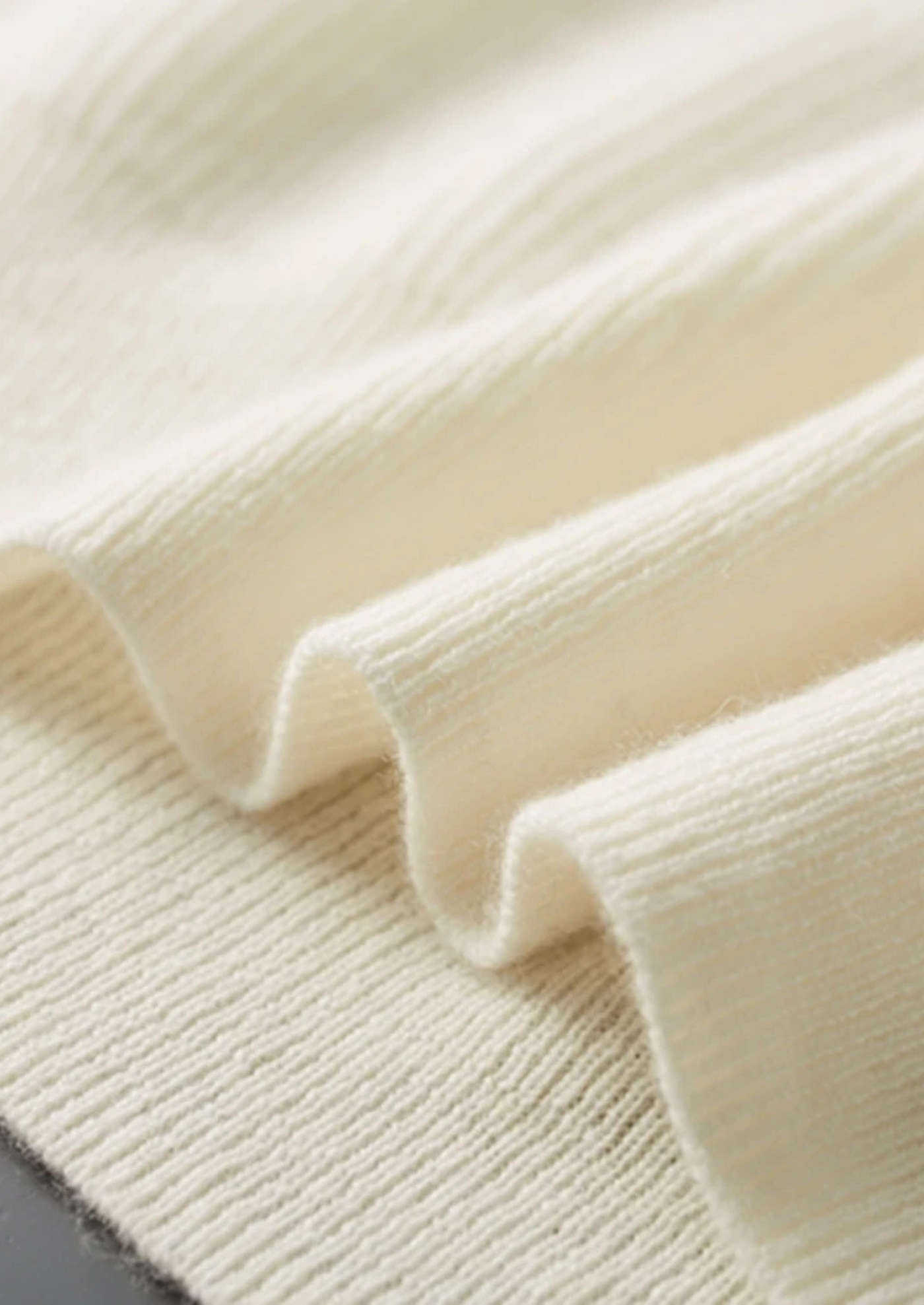 MAGLIONE CON BOTTONI IN 100% CASHMERE